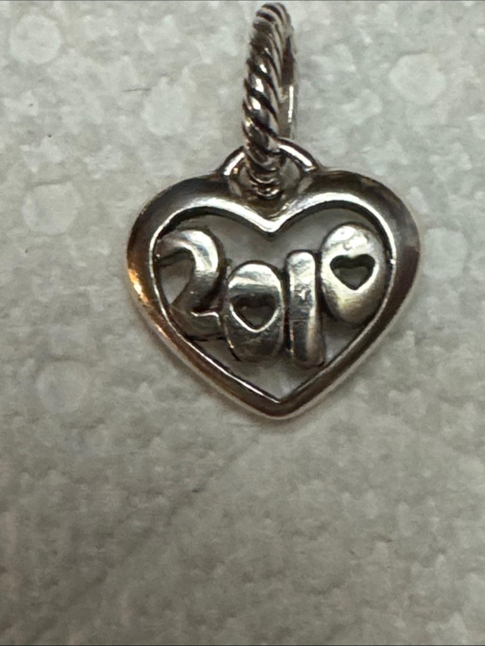 Brighton 2010 silver plated retired charm.
RETIRED